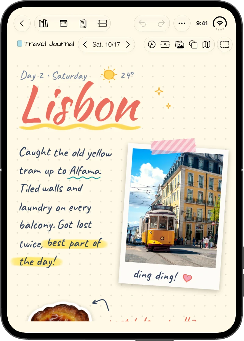 The open iPhone Duo held upright: a handwritten travel page about Lisbon with a photo of a yellow tram